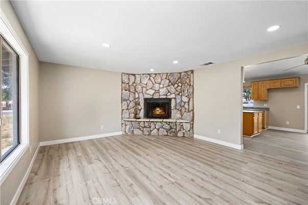 Empty room, Fireplace, Interior, Recessed Lighting, Wood Texture Flooring