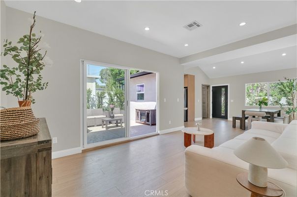 Dining room, Fireplace, Interior, Living room, Recessed Lighting, Wood Texture Flooring