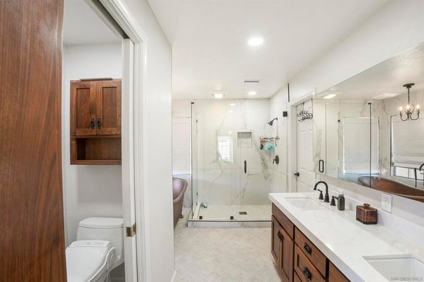 Bathroom, Dual Sink Vanities, Glass Shower, Interior, Marble Walls, Recessed Lighting