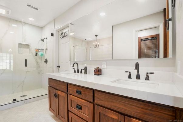 Bathroom, Dual Sink Vanities, Glass Shower, Interior, Marble Walls, Recessed Lighting