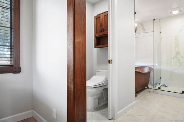 Bathroom, Glass Shower, Interior, Marble Walls, Wood Texture Flooring