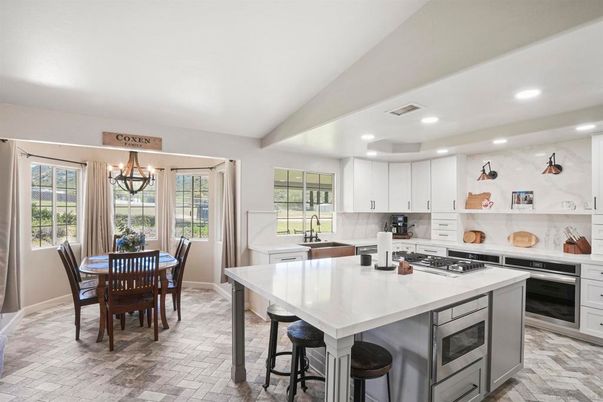 Chandelier, Dining room, Interior, Kitchen, Recessed Lighting, Stainless Steel Appliances