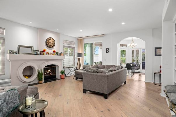 Chandelier, Dining room, Fireplace, Interior, Living room, Recessed Lighting, Wood Texture Flooring