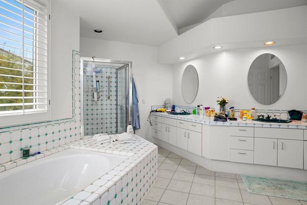Bathroom, Dual Sink Vanities, Glass Shower, Interior, Recessed Lighting, Tile Countertops