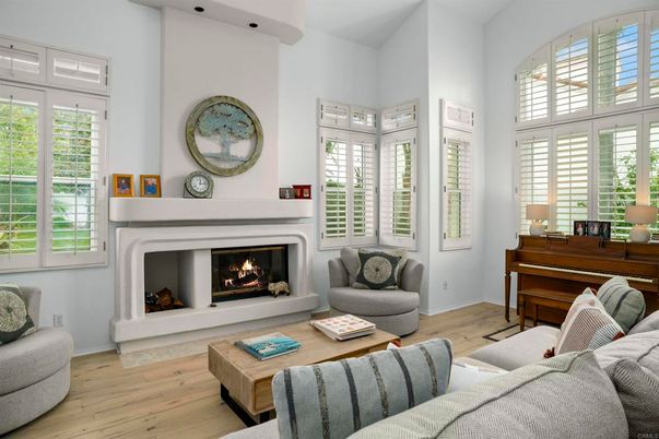 Fireplace, Interior, Living room, Piano, Recessed Lighting, Wood Texture Flooring