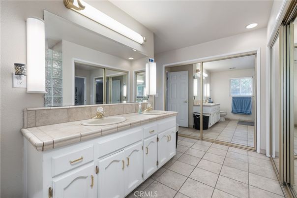 Bathroom, Dual Sink Vanities, Interior, Recessed Lighting, Tile Countertops