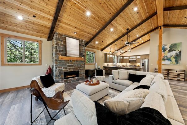 Fireplace, Interior, Kitchen, Living room, Pendant Lights, Recessed Lighting, Stainless Steel Appliances, Stone Walls, Wooden Beams, Wooden Ceilings, Wood Texture Flooring