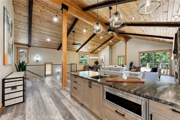 Dining room, Interior, Kitchen, Living room, Pendant Lights, Recessed Lighting, Stainless Steel Appliances, Wooden Beams, Wooden Ceilings, Wood Texture Flooring