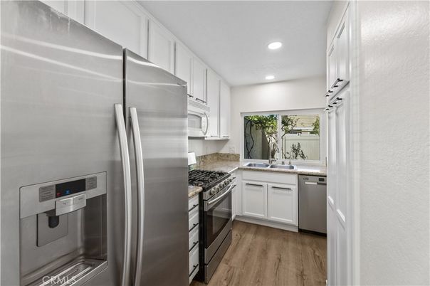 Interior, Kitchen, Recessed Lighting, Stainless Steel Appliances, Wood Texture Flooring