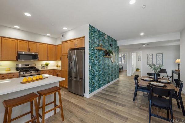Dining room, Interior, Kitchen, Recessed Lighting, Stainless Steel Appliances, Wood Texture Flooring
