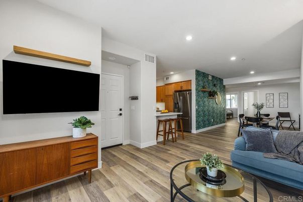 Dining room, Interior, Kitchen, Living room, Recessed Lighting, Stainless Steel Appliances, Wood Texture Flooring