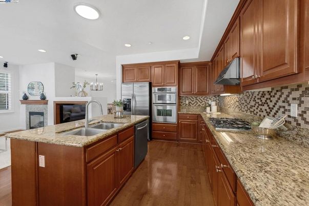 Chandelier, Interior, Kitchen, Recessed Lighting, Stainless Steel Appliances, Wood Texture Flooring