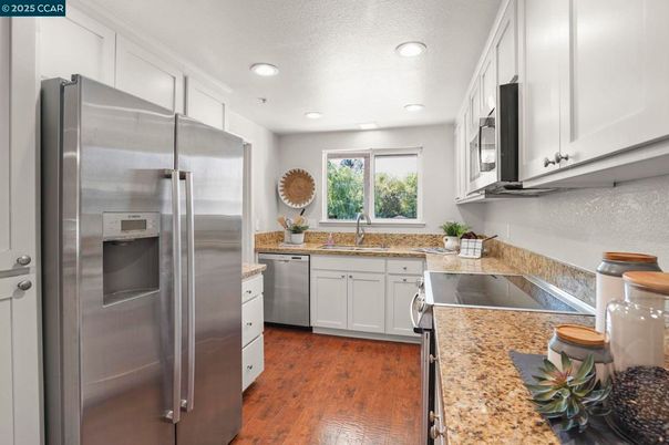 Interior, Kitchen, Recessed Lighting, Stainless Steel Appliances, Wood Texture Flooring