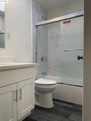 Bathroom, Glass Shower, Interior, Marble Walls, Wood Texture Flooring