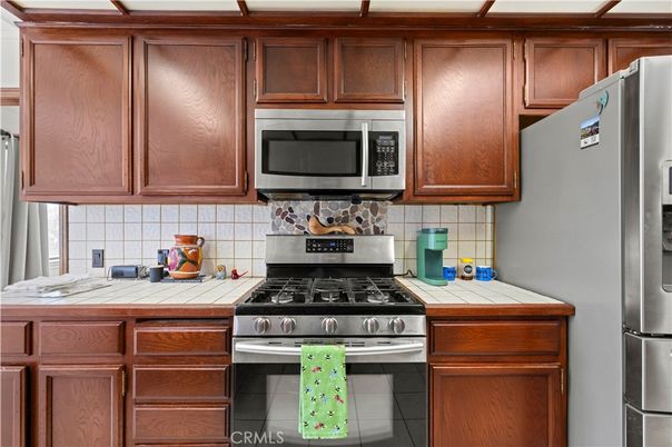 Interior, Kitchen, Stainless Steel Appliances, Tile Countertops