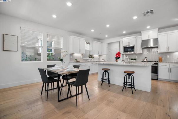 Dining room, Interior, Kitchen, Recessed Lighting, Stainless Steel Appliances, Wood Texture Flooring