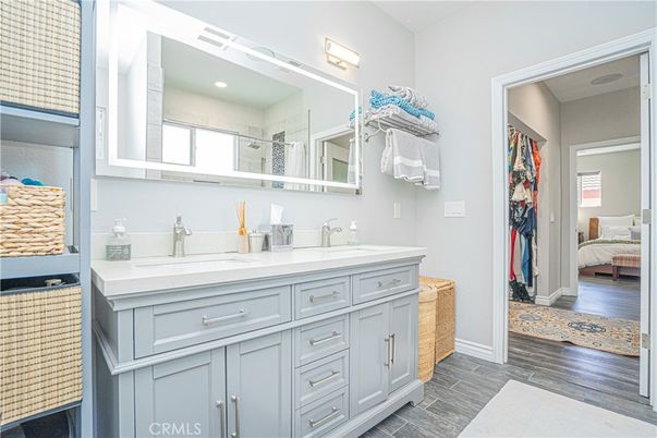 Bathroom, Bedroom, Dual Sink Vanities, Interior, Recessed Lighting, Wood Texture Flooring