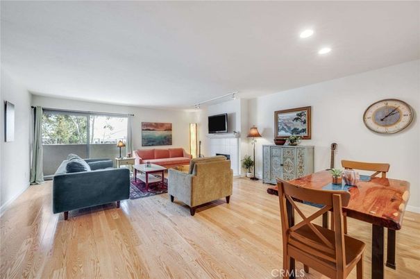 Dining room, Fireplace, Interior, Living room, Recessed Lighting, Wood Texture Flooring