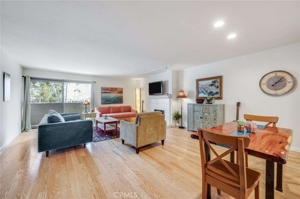 Dining room, Fireplace, Interior, Living room, Recessed Lighting, Wood Texture Flooring