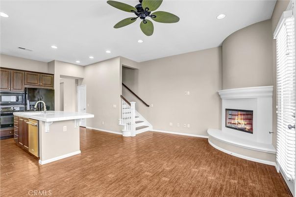 Fireplace, Interior, Kitchen, Recessed Lighting, Wood Texture Flooring