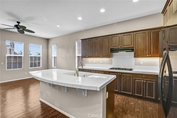 Interior, Kitchen, Recessed Lighting, Tile Countertops, Wood Texture Flooring