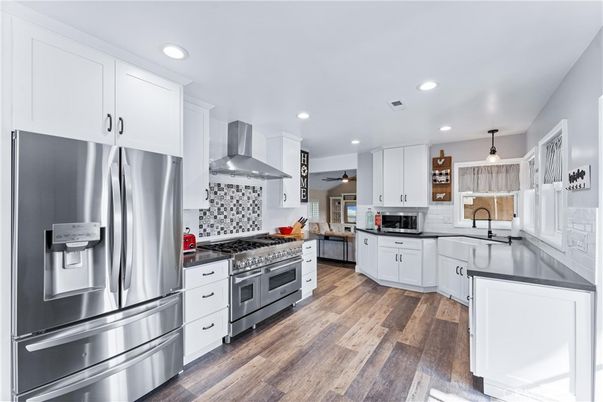 Interior, Kitchen, Pendant Lights, Recessed Lighting, Stainless Steel Appliances, Wood Texture Flooring