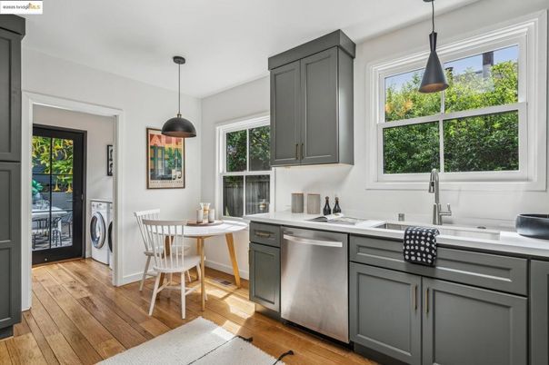 Dining room, Interior, Kitchen, Pendant Lights, Washer, Wood Texture Flooring