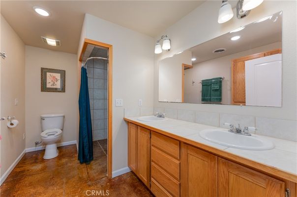 Bathroom, Dual Sink Vanities, Interior, Recessed Lighting, Tile Countertops