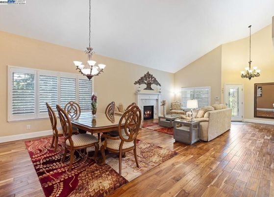 Chandelier, Dining room, Fireplace, Interior, Living room, Pendant Lights, Wood Texture Flooring
