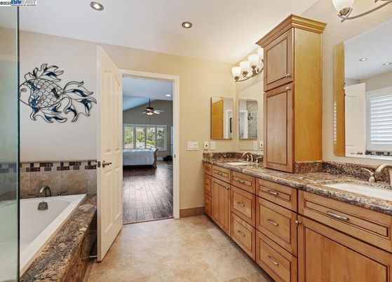 Bathroom, Dual Sink Vanities, Interior, Recessed Lighting, Wood Texture Flooring