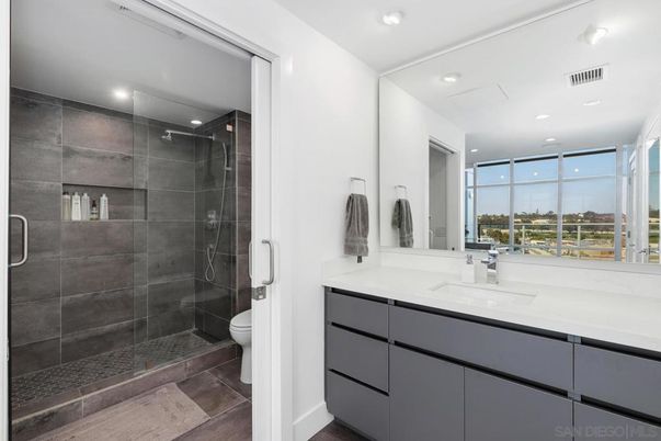 Bathroom, Glass Shower, Interior, Recessed Lighting, Wood Texture Flooring