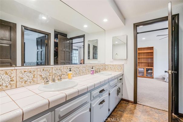 Bathroom, Dual Sink Vanities, Interior, Recessed Lighting, Tile Countertops