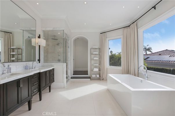Bathroom, Dual Sink Vanities, Free Standing Baths, Glass Shower, Interior, Marble Walls, Recessed Lighting