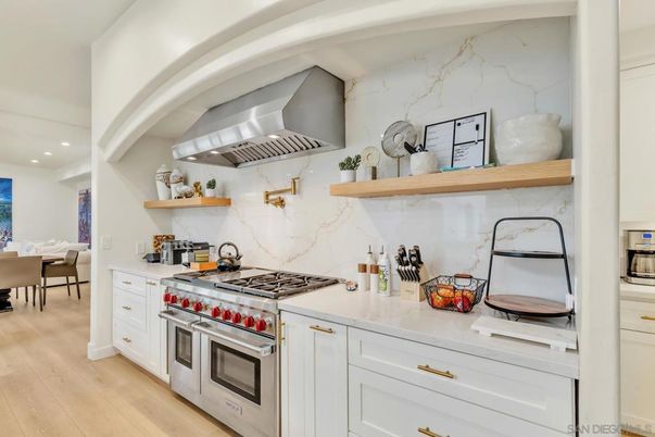 Dining room, Interior, Kitchen, Marble Walls, Recessed Lighting, Stainless Steel Appliances, Wood Texture Flooring