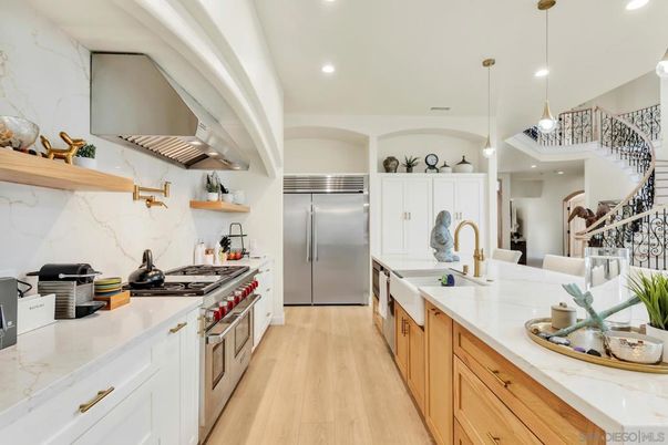 Interior, Kitchen, Marble Walls, Pendant Lights, Recessed Lighting, Stainless Steel Appliances, Wood Texture Flooring