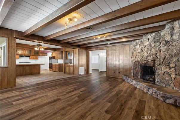 Empty room, Fireplace, Interior, Stone Walls, Wooden Beams, Wood Texture Flooring, Wooden Walls