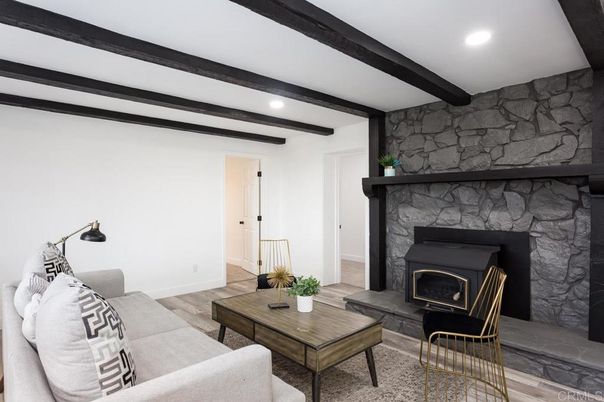 Fireplace, Interior, Living room, Recessed Lighting, Stone Walls, Wooden Beams, Wood Texture Flooring