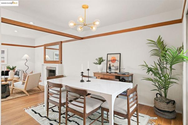Dining room, Fireplace, Interior, Living room, Pendant Lights, Recessed Lighting, Wood Texture Flooring