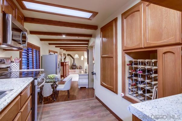 Dining room, Interior, Kitchen, Recessed Lighting, Stainless Steel Appliances, Wooden Beams, Wood Texture Flooring