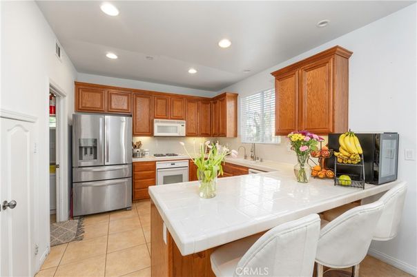 Interior, Kitchen, Recessed Lighting, Stainless Steel Appliances, Tile Countertops