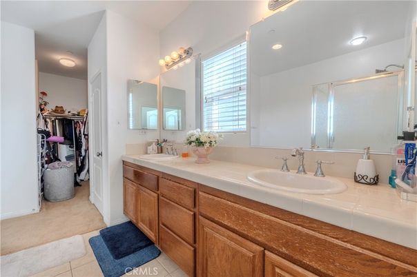 Bathroom, Dual Sink Vanities, Glass Shower, Interior, Recessed Lighting, Tile Countertops