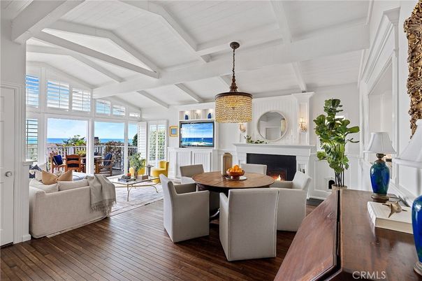 Dining room, Fireplace, Interior, Living room, Pendant Lights, Water, Wood Texture Flooring