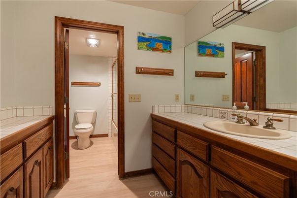 Bathroom, Interior, Tile Countertops, Wood Texture Flooring