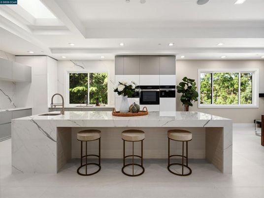 Interior, Kitchen, Marble Walls, Recessed Lighting, Stainless Steel Appliances