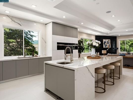 Interior, Kitchen, Marble Walls, Recessed Lighting, Stainless Steel Appliances