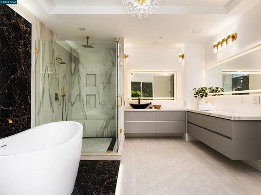 Bathroom, Dual Sink Vanities, Free Standing Baths, Glass Shower, Interior, Marble, Marble Walls, Recessed Lighting