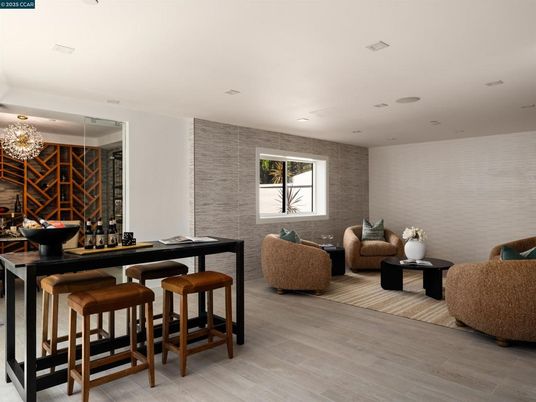 Chandelier, Interior, Living room, Recessed Lighting, Stone Walls, Wine Storage, Wood Texture Flooring
