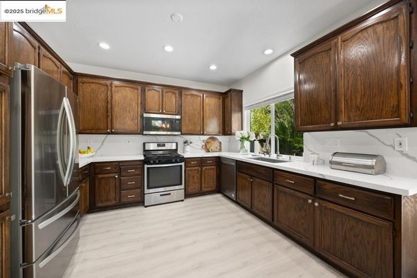 Interior, Kitchen, Recessed Lighting, Stainless Steel Appliances, Wood Texture Flooring