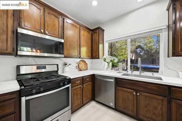 Interior, Kitchen, Recessed Lighting, Stainless Steel Appliances, Wood Texture Flooring