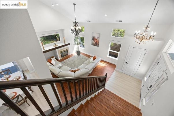 Chandelier, Fireplace, Interior, Living room, Recessed Lighting, Wood Texture Flooring